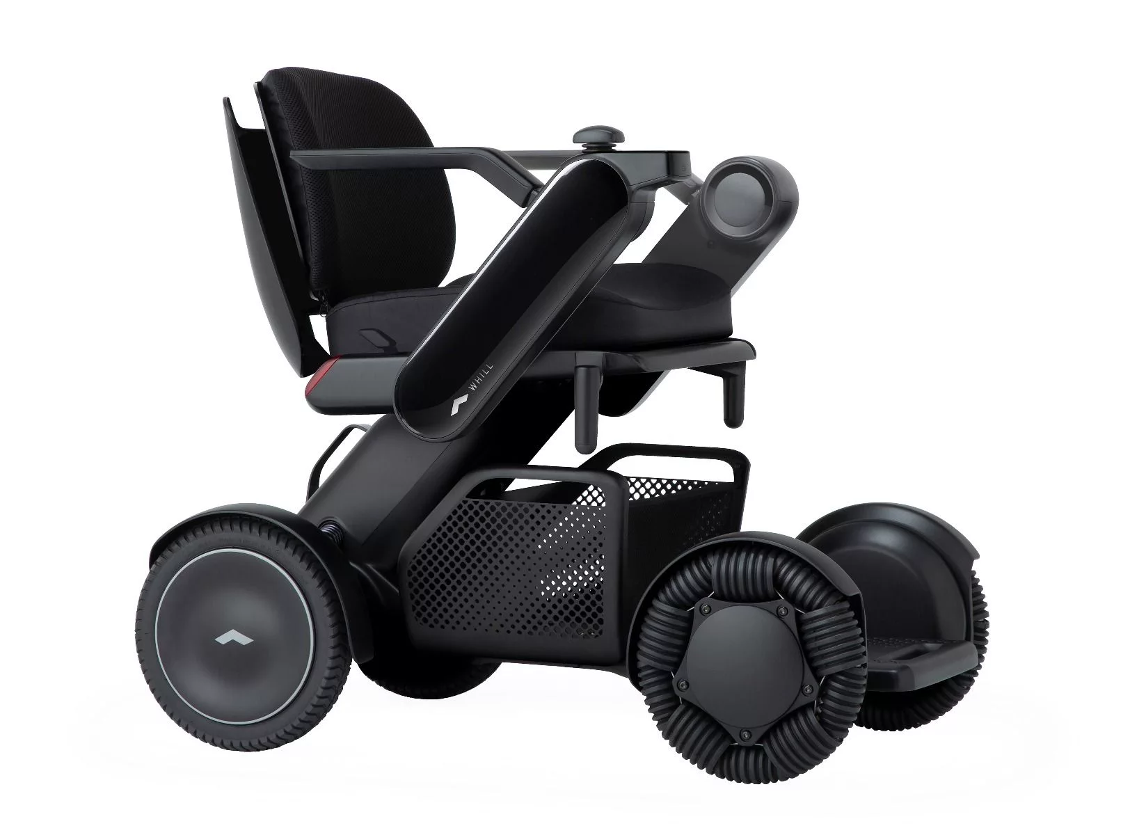 WHILL Model Ci2 The WHILL Model Ci2 power wheelchair. This is a black power wheelchair